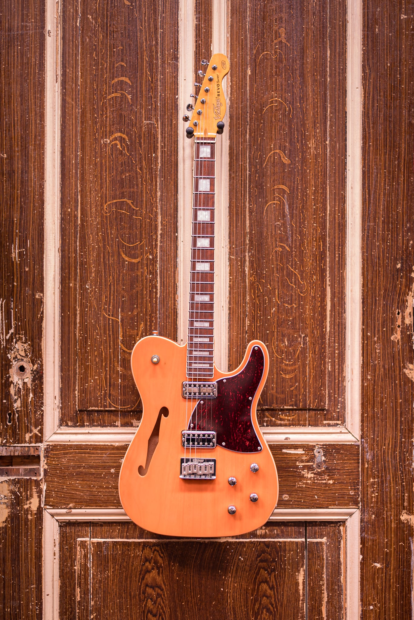 Vintage REVO Series 'Midline' Trans Orange Elektrische gitaar